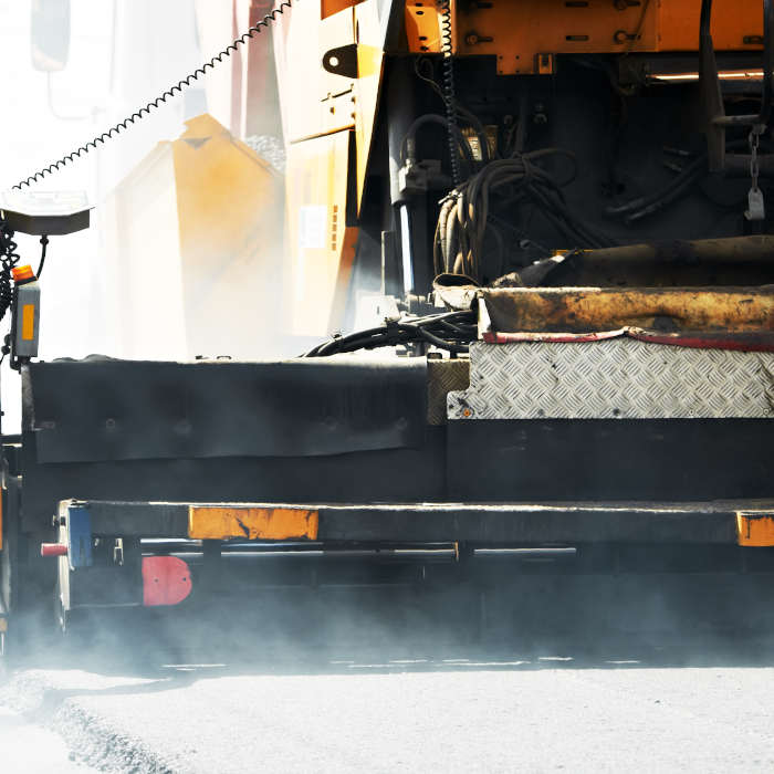 hot asphalt being laid
