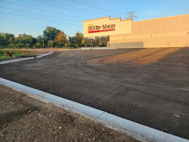the final sub base for asphalt parking lot installed.