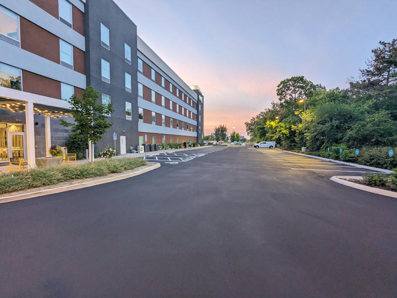 apartment building parking lot with new sealcoating