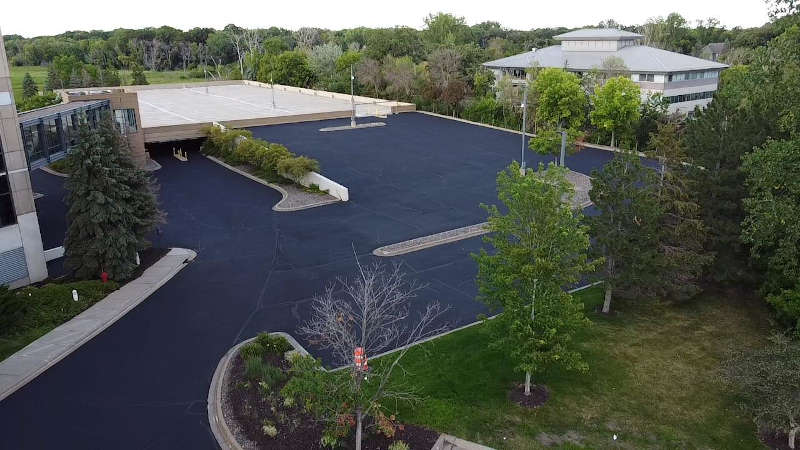 areal view of parking lot that has just had coating applied to it. 