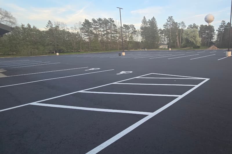 parking lot strips being painted.