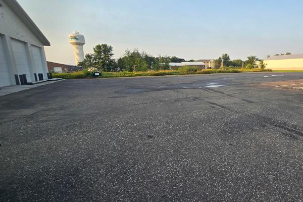 Before photo of CMDI's parking lot.
