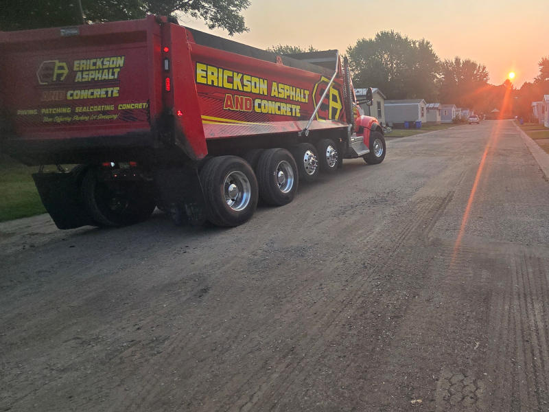 Erickson Asphalt truck at Isanti Estates, getting ready to start project. 