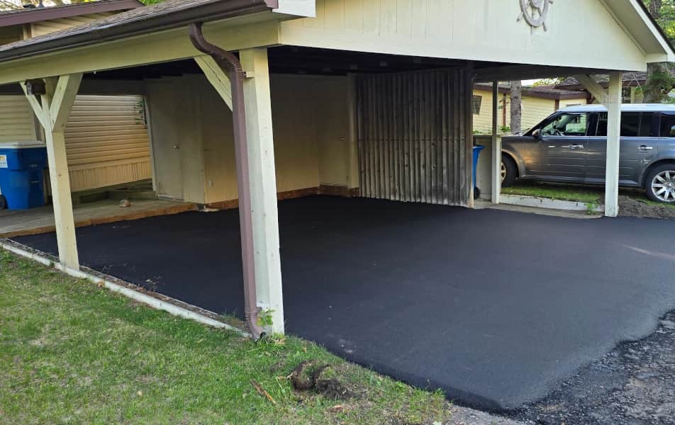 Small driveway paved in Pine Village community