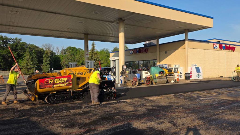 hot mix asphalt being laid in gas station