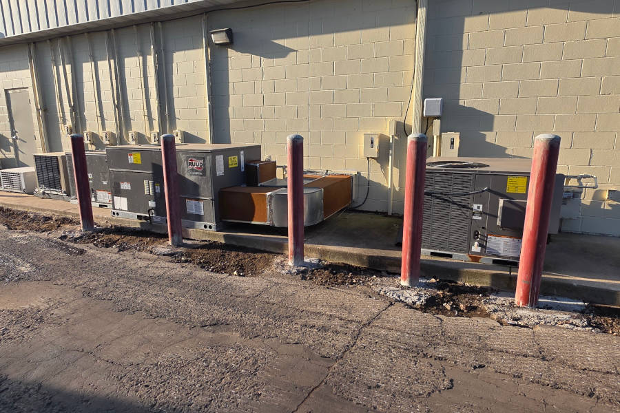 Bollards installed to protect HVAC equpiment