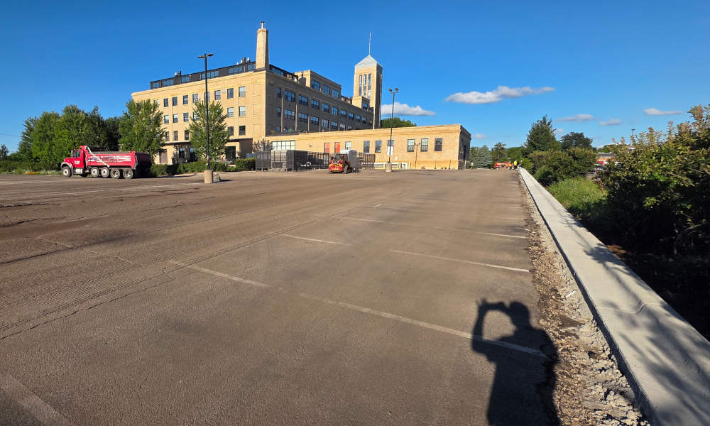 Concrete curbing installed in parking lot.