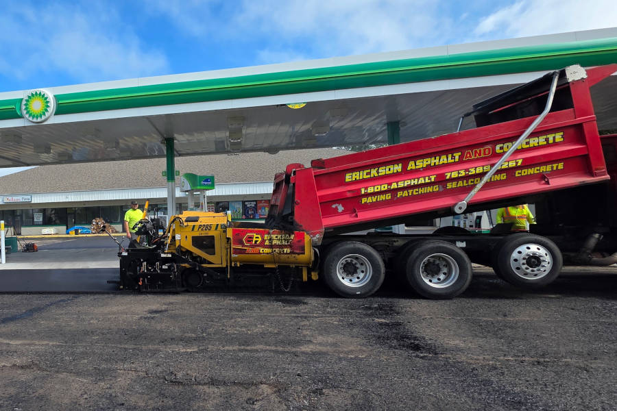crew installing hot mix asphalt 
