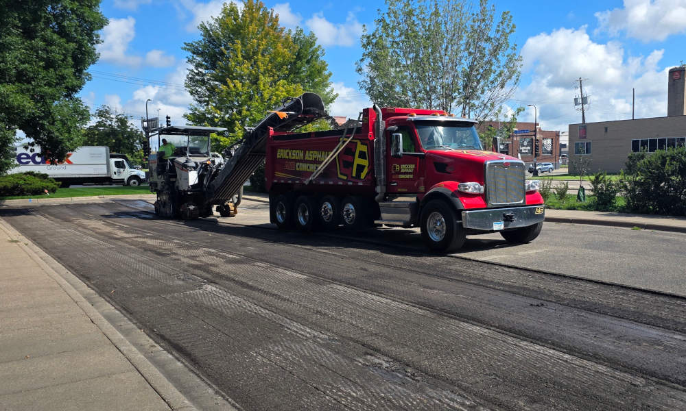 asphalt being milled from a parking lot